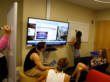 student using whiteboard