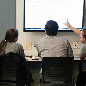 students looking at shared display